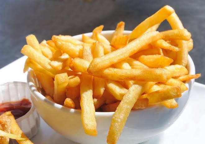 Golden seasoned fries fried crisp to order at Preva Kitchen Redford MI
