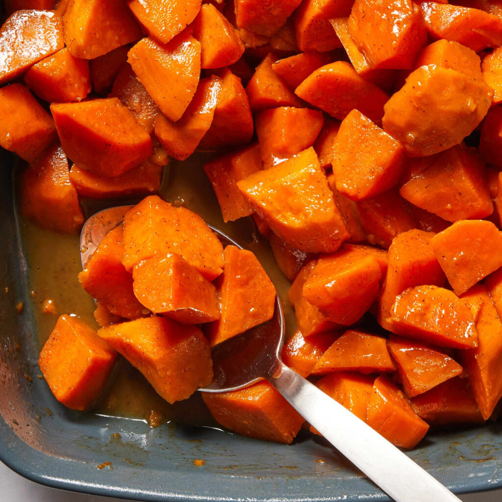 Candied yams baked soft in a brown sugar glaze at Preva Kitchen Redford MI