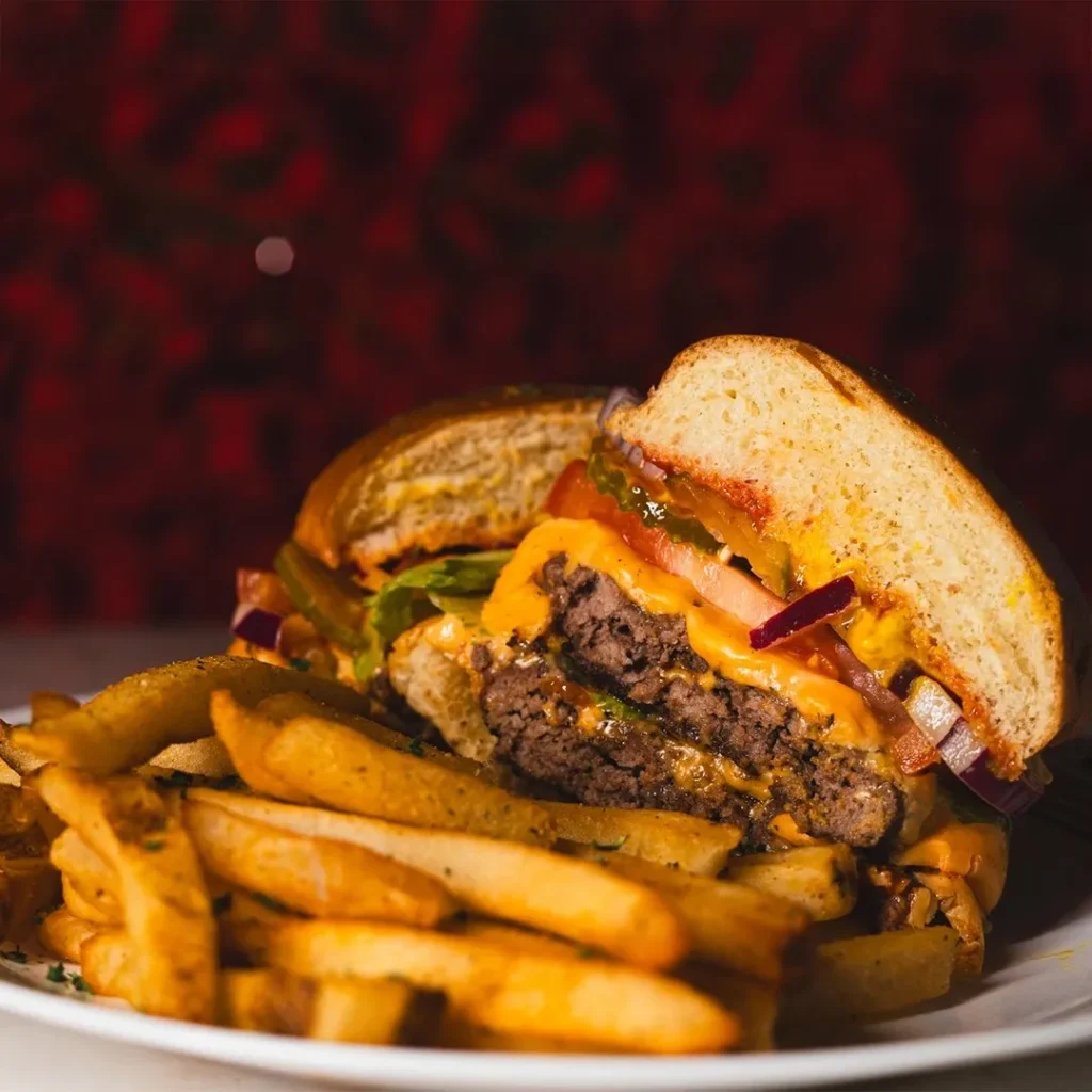 Preva Double Smash Burger with two patties, American cheese and fries at Preva Kitchen in Redford, MI