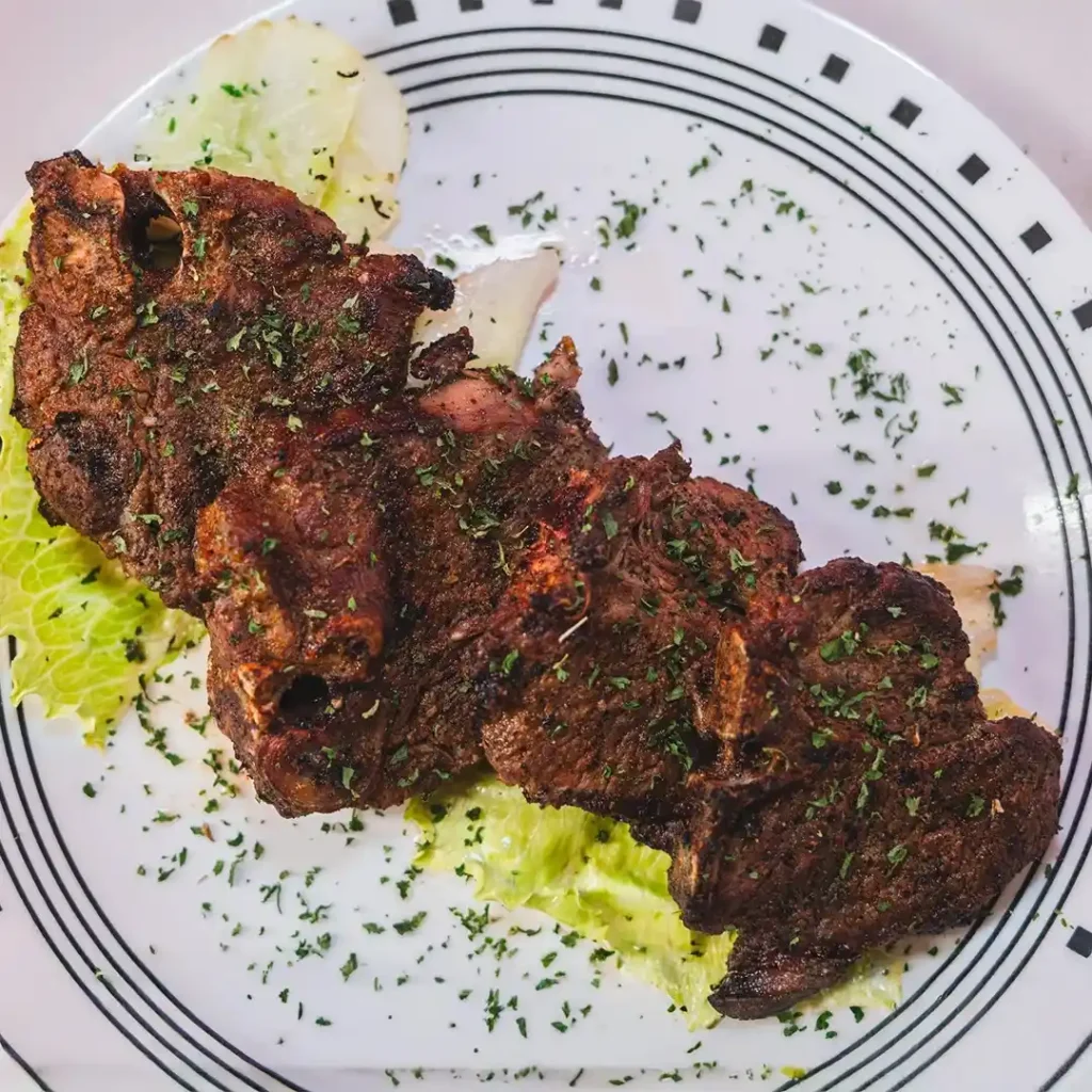 Preva Lamb grilled lamb chops with house spices and choice of sides at Preva Kitchen, Redford Township MI